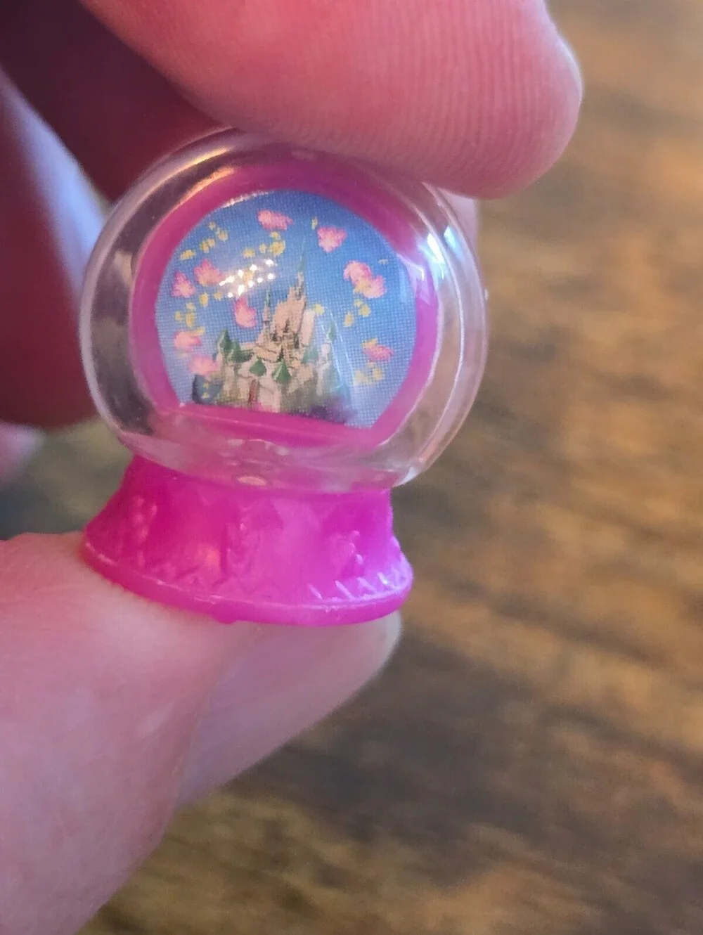Disney Princess miniature snow globe with a pink base American Girl